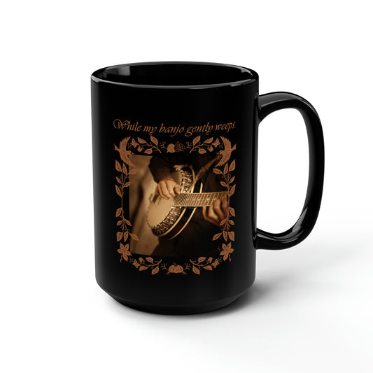 WHILE MY BANJO GENTLY WEEPS BLACK MUG, 15oz